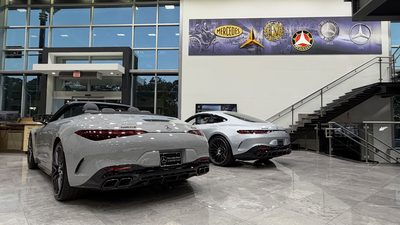 AMG SL and AMG GT in front of the heritage mural