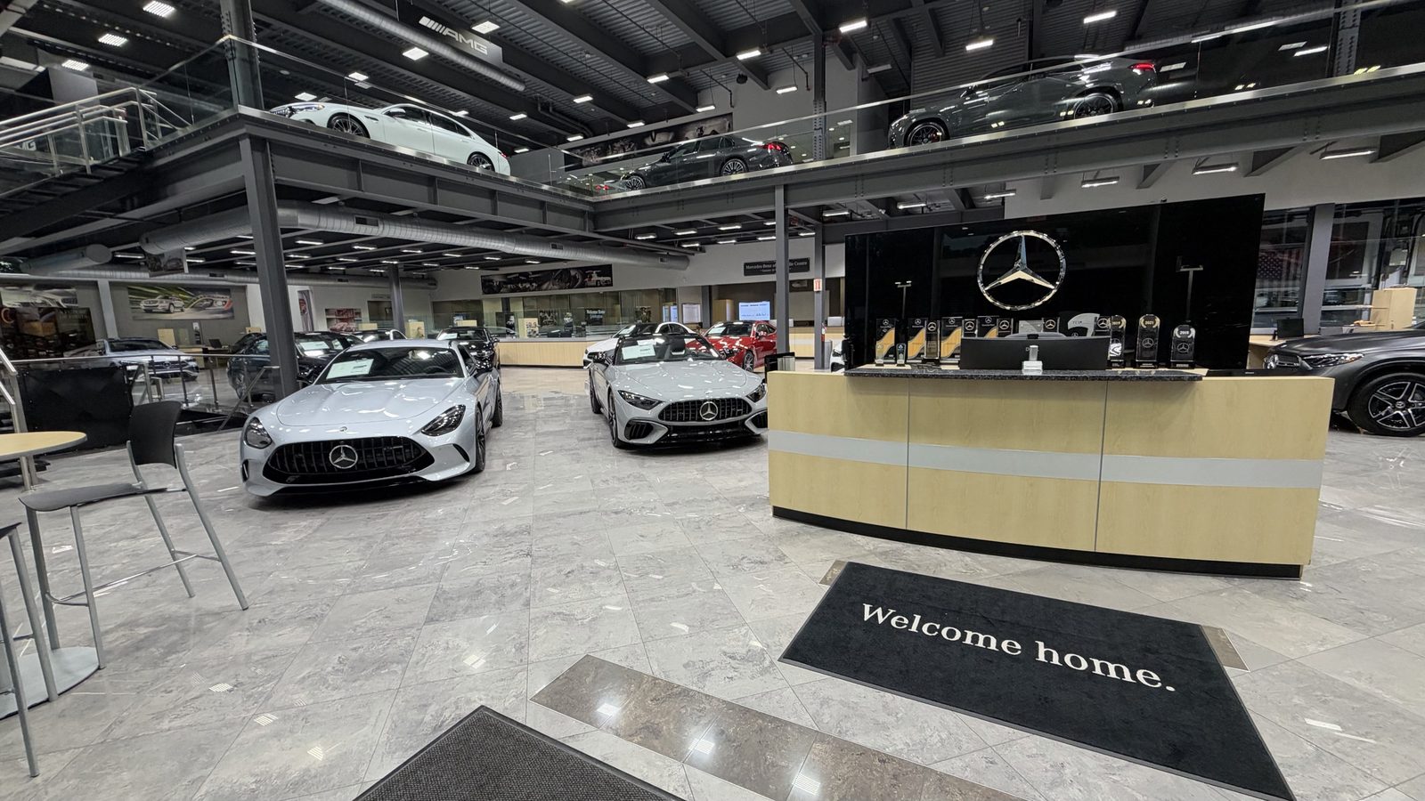 An AMG GT coupe and AMG SL roadster at reception