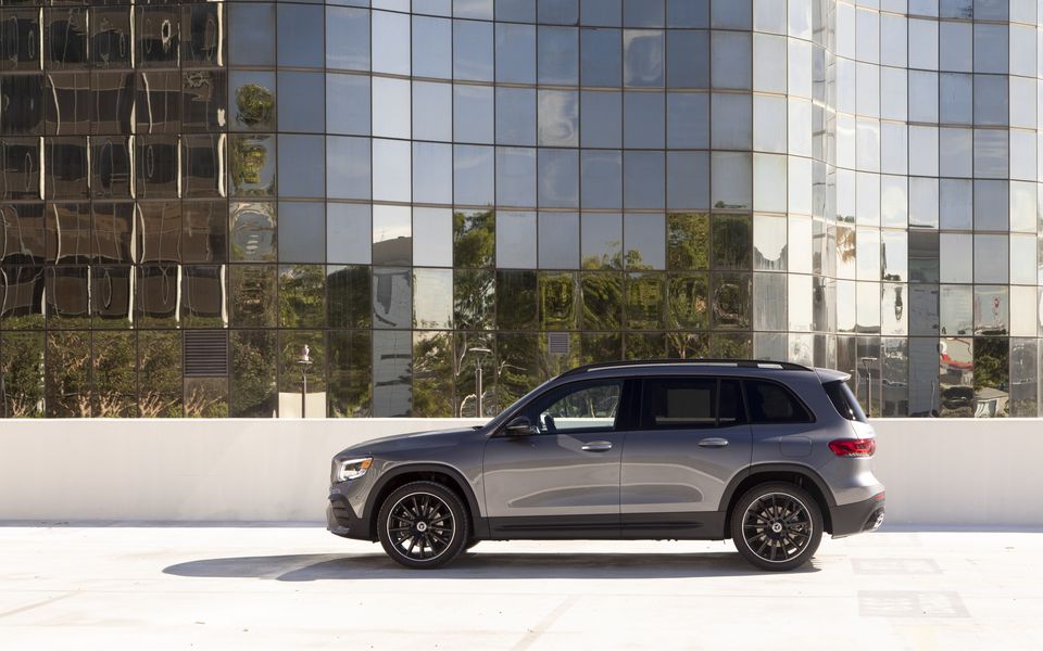 Mercedes-Benz GLB SUV parked in front of an office tower