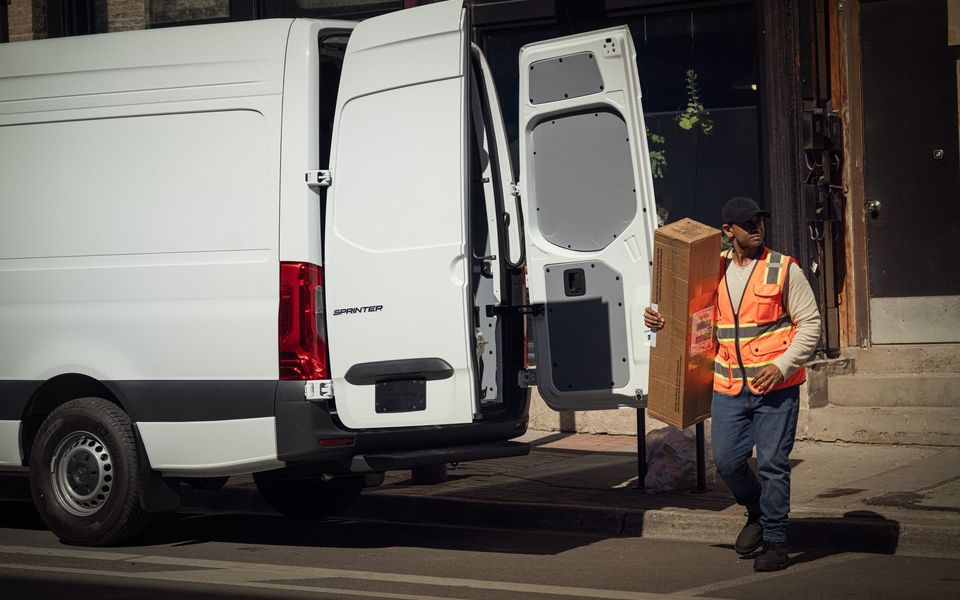Courier unloading a Sprinter Cargo Van